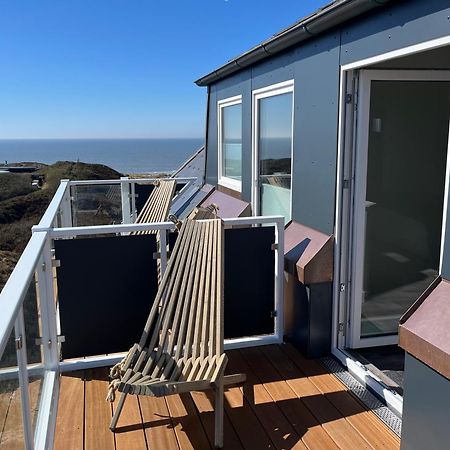 Gurtdeel Leuchtturm-Suite เฮอร์นุม ภายนอก รูปภาพ