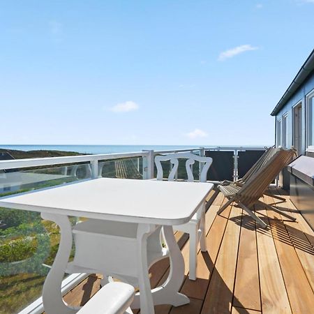 Gurtdeel Leuchtturm-Suite เฮอร์นุม ภายนอก รูปภาพ