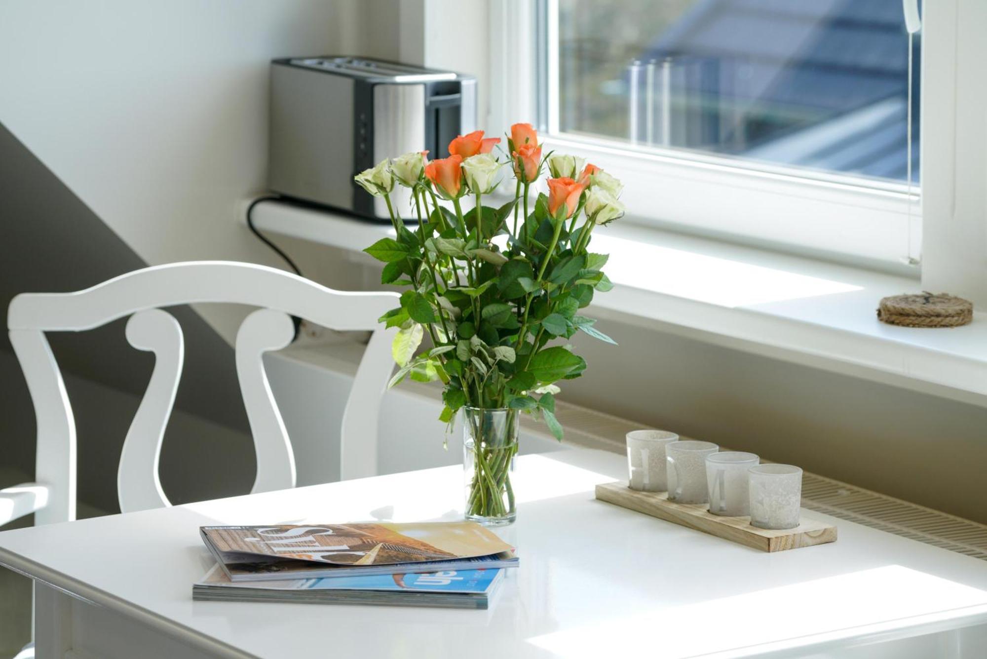 Gurtdeel Leuchtturm-Suite เฮอร์นุม ภายนอก รูปภาพ
