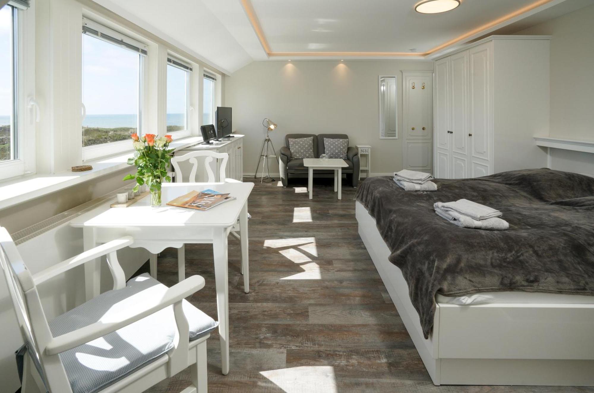 Gurtdeel Leuchtturm-Suite เฮอร์นุม ภายนอก รูปภาพ