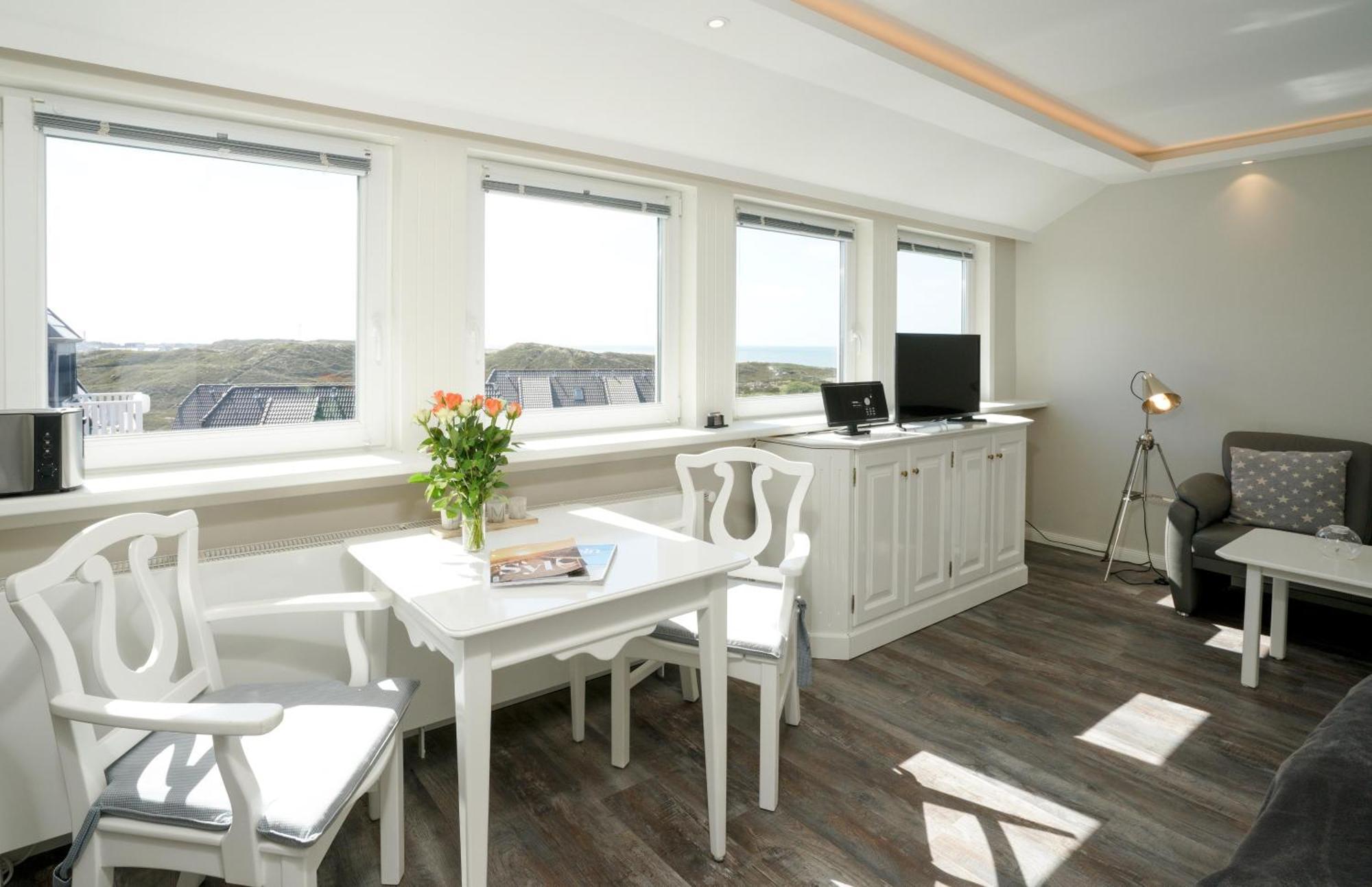 Gurtdeel Leuchtturm-Suite เฮอร์นุม ภายนอก รูปภาพ