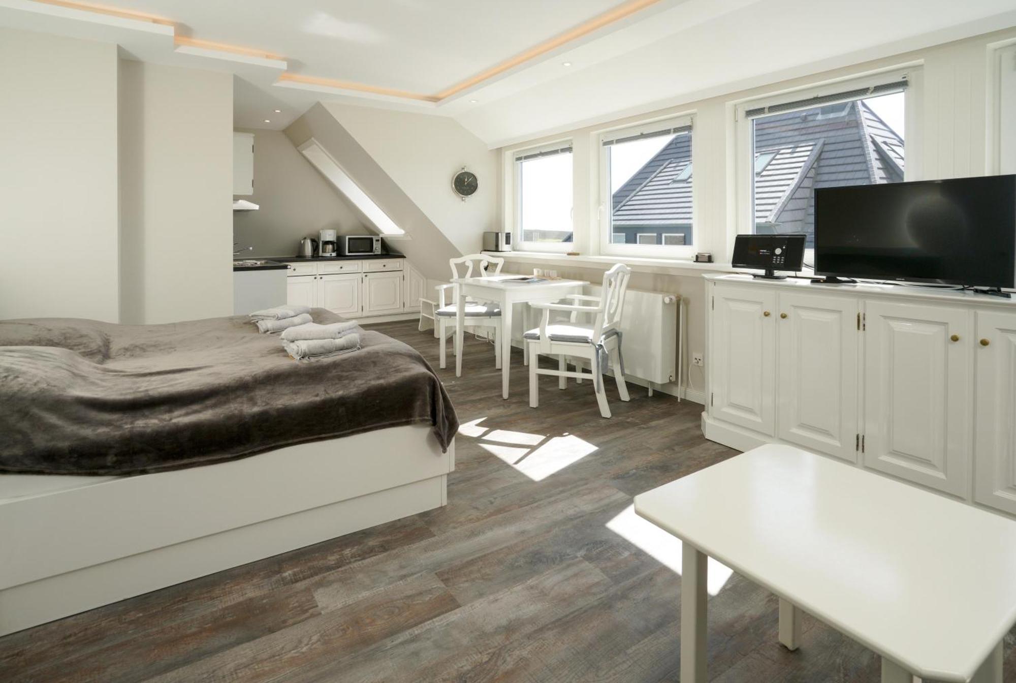 Gurtdeel Leuchtturm-Suite เฮอร์นุม ภายนอก รูปภาพ