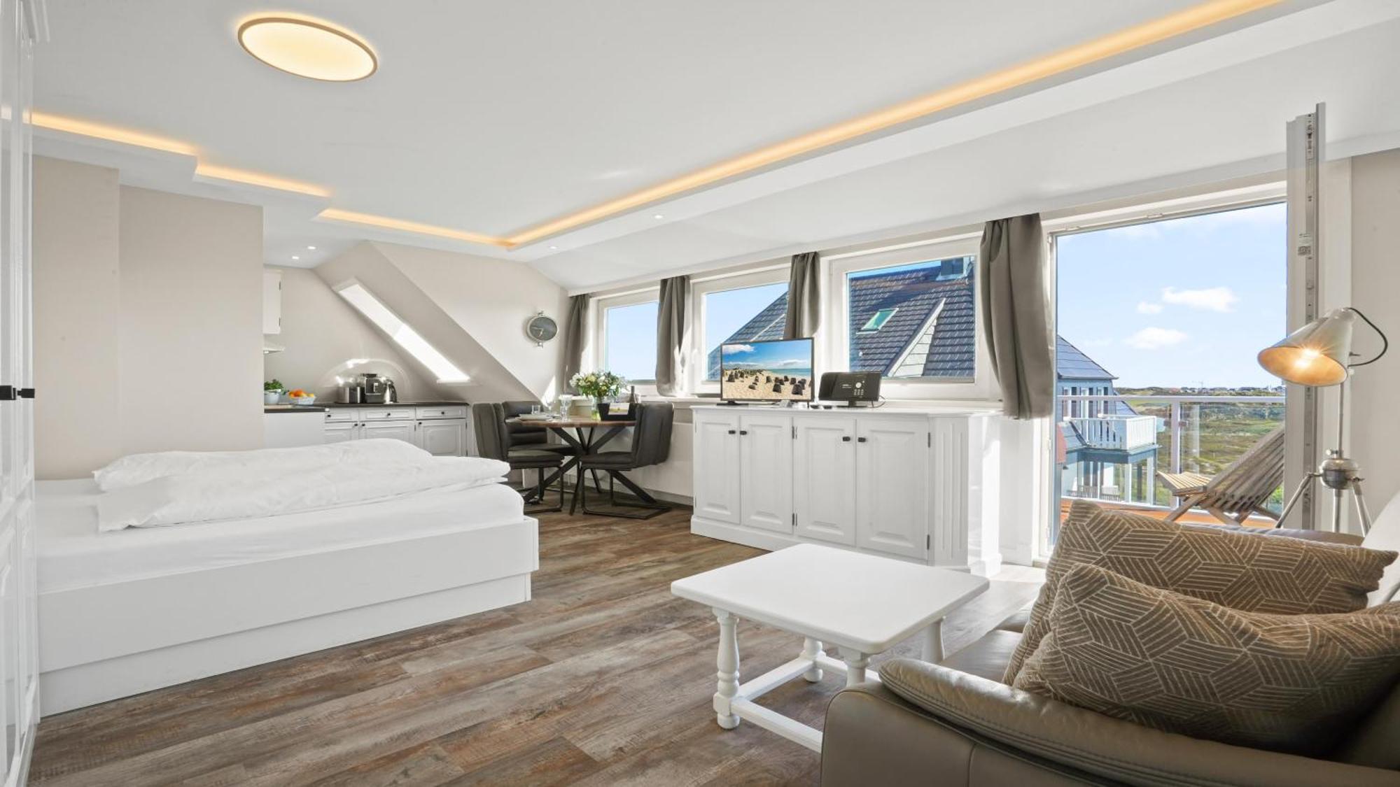 Gurtdeel Leuchtturm-Suite เฮอร์นุม ภายนอก รูปภาพ