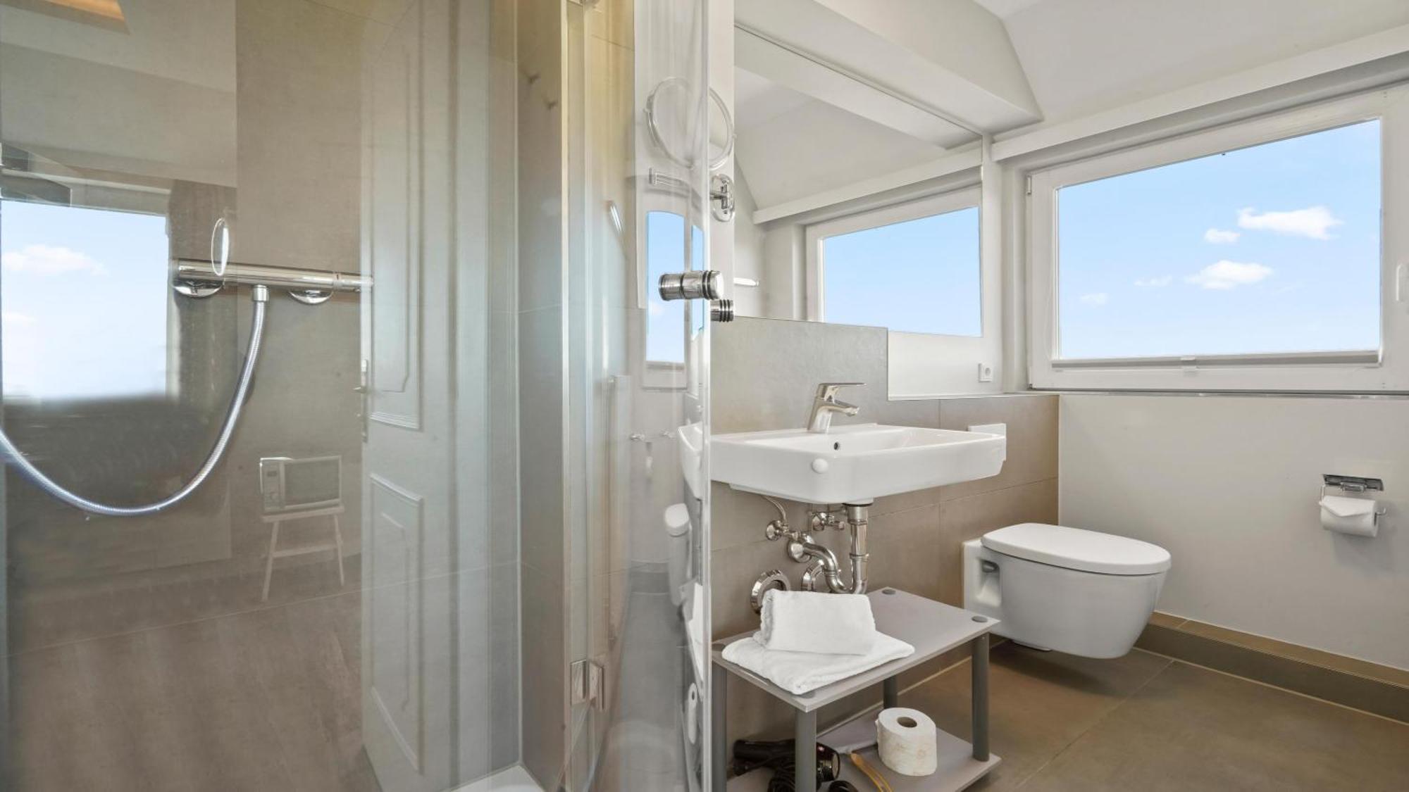 Gurtdeel Leuchtturm-Suite เฮอร์นุม ภายนอก รูปภาพ